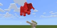 Iron Golem Attacking a Ravager (Image via Minecraft)